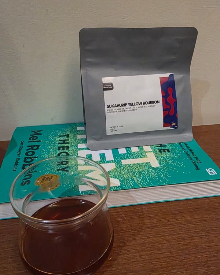 A cup of Sukahurip Yellow Bourbon, washed anaerobic, next to the bag it came in